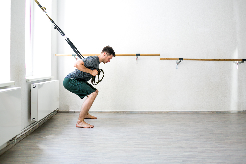 Beintraining mit dem Schlingentrainer