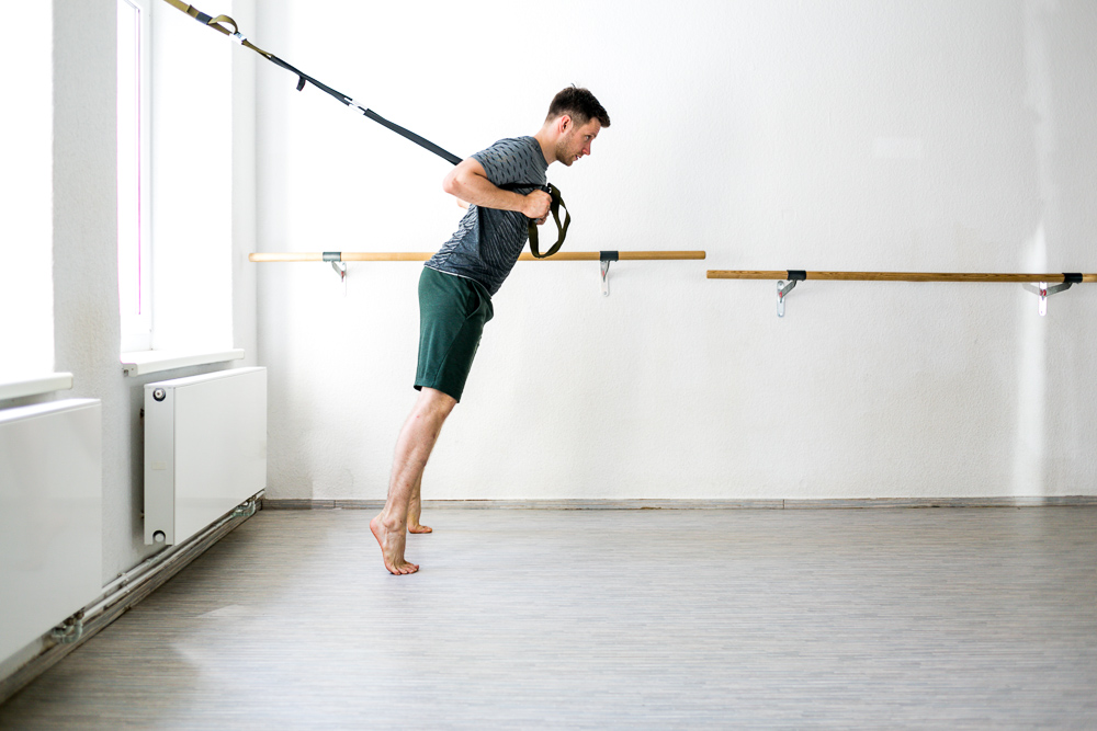Beintraining mit dem Schlingentrainer